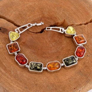 24.50 gr. Baltic amber bracelet multicolor silver plated: Gorgeous Baltic amber bracelet . Have healing power and works on mental clarity and mood balance and boosts confidence. It helps relieve ailments of the stomach, respiratory system and lungs, endocrin