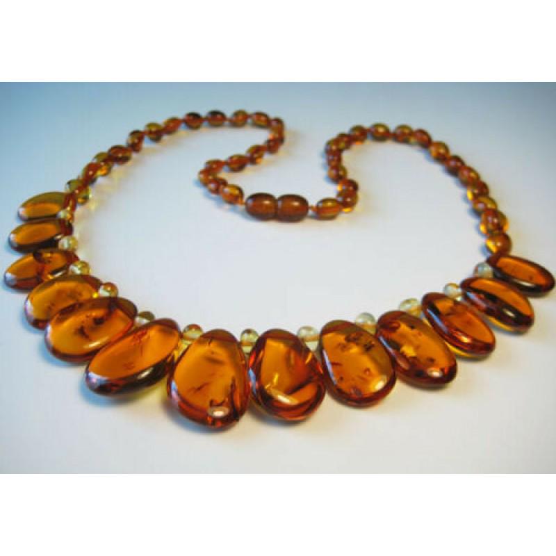 Natural Baltic amber necklace Cognac color butterscotch egg yolk: Gorgeous Baltic amber necklace. Have healing power and works on mental clarity and mood balance and boosts confidence. It helps relieve ailments of the stomach, respiratory system and lungs, endocrine