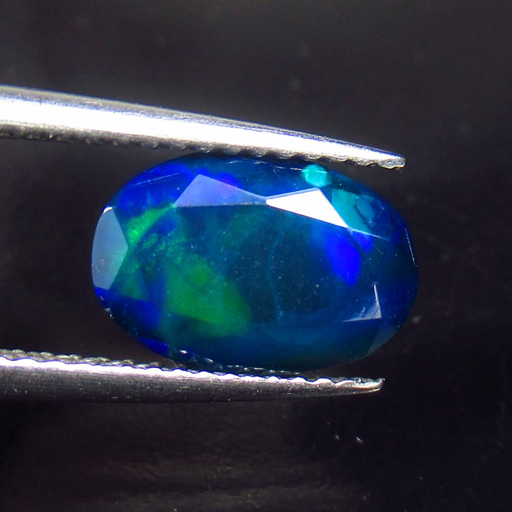 1.23 Ctw Natural Ethiopian Black Fire Opal Oval Cut: No Reserve! Title: 1.23 Ctw Natural Ethiopian Black Fire Opal Oval Cut Stone Clarity: Translucent Gemstones: Black Opal Carat Weights: 1.23 Size/Dimensions: 10.30 x 7.00 x 4.20 mm Additional Informati