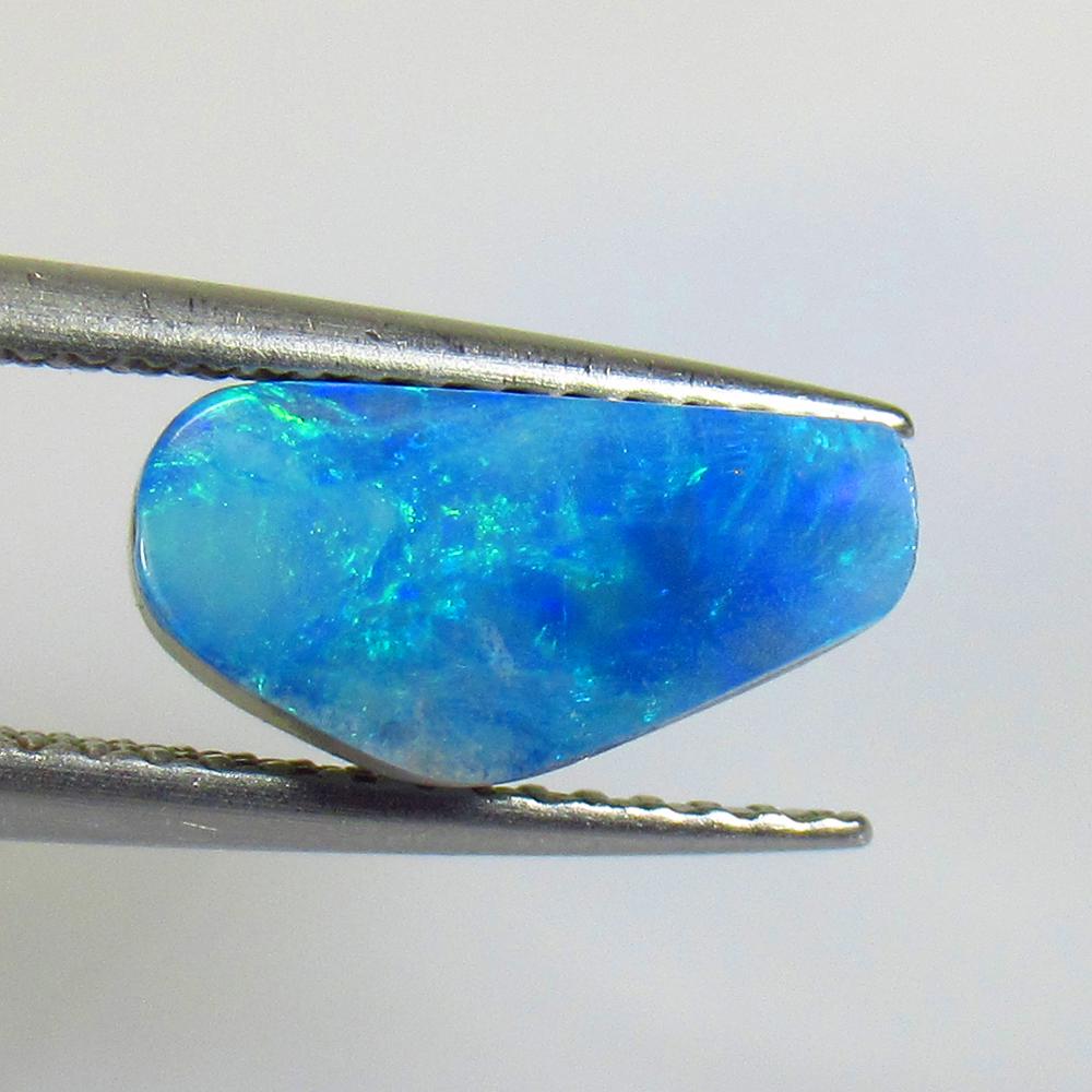 1.89 Ctw Natural Australian Doublet Opal Unshaped Cabochon: No Reserve! Title: 1.89 Ctw Natural Australian Doublet Opal Unshaped Cabochon Stone Clarity: Opaque Gemstones: Australian Duoblet Opal Carat Weights: 1.89 Size/Dimensions: 11.00 x 5.50 x 4.40 mm Addit