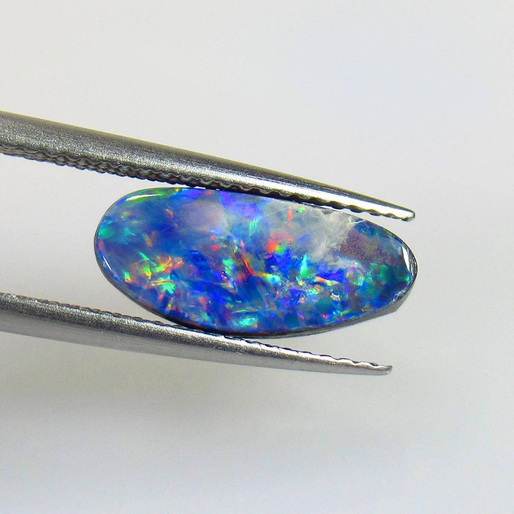 3.03 Ctw Natural Australian Doublet Opal Oval Cabochon: No Reserve! Title: 3.03 Ctw Natural Australian Doublet Opal Oval Cabochon Stone Clarity: Opaque Gemstones: Australian Duoblet Opal Carat Weights: 3.03 Size/Dimensions: 13.80 x 6.10 x 3.70 mm Additiona