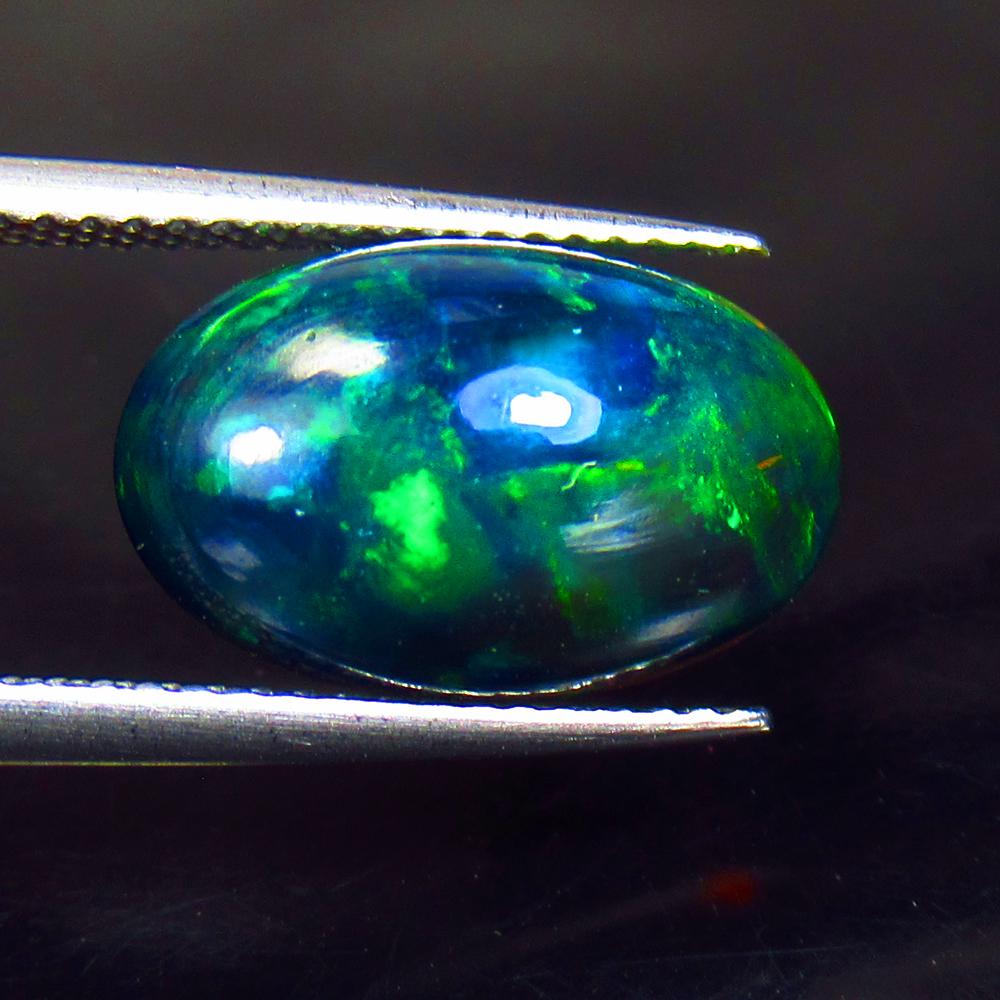 4.55 Ct Natural Ethiopian Black Fire Opal Oval Cab (1 of 2)