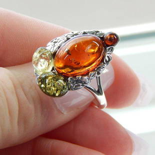 Genuine Multicolor Baltic Amber Mayan 925 Silver Ring: Gorgeous 925 sterling silver ring with genuine Baltic amber This design is Mayan inspired and has three different types of amber Size 6.25 Cognac amber, which is the main body and head of the ring,