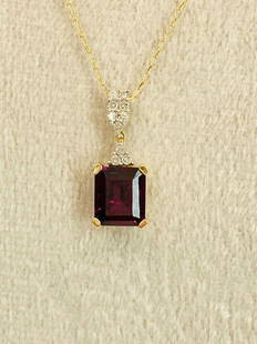 14K Solid Yellow Gold Purple Garnet and Diamond Necklace: Title: 14K Solid Yellow Gold Purple Garnet and Diamond NecklaceSize: 16" ChainAdditional Information: New with tags 14K solid yellow gold purple garnet and diamond necklace 10 Diamonds 1 Garnet
