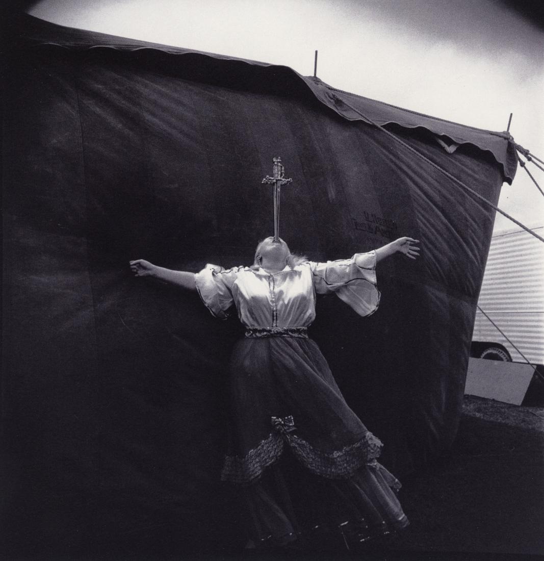 DIANE ARBUS - Albino Sword Swallower At A Carnival: Artist: Diane Arbus Title: Albino Sword Swallower At A Carnival, MD, 1970 Medium: Photo Litho, 1999, Germany Dimensions: 7.15x7.4" Description: Heat Wax Mounted on 8.5x11" Conservation Board Artist Bi
