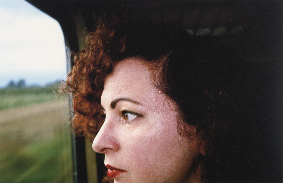 NAN GOLDIN - Self Portrait on Train, Germany, 1992: Artist: Nan Goldin Title: Self Portrait on the Train, Germany, 1992 Medium: Photo Litho, 1999, Germany Dimensions: 8.5x5.55" Description: Heat Wax Mounted on 8.5x11" Conservation Board Artist Bio: Nan