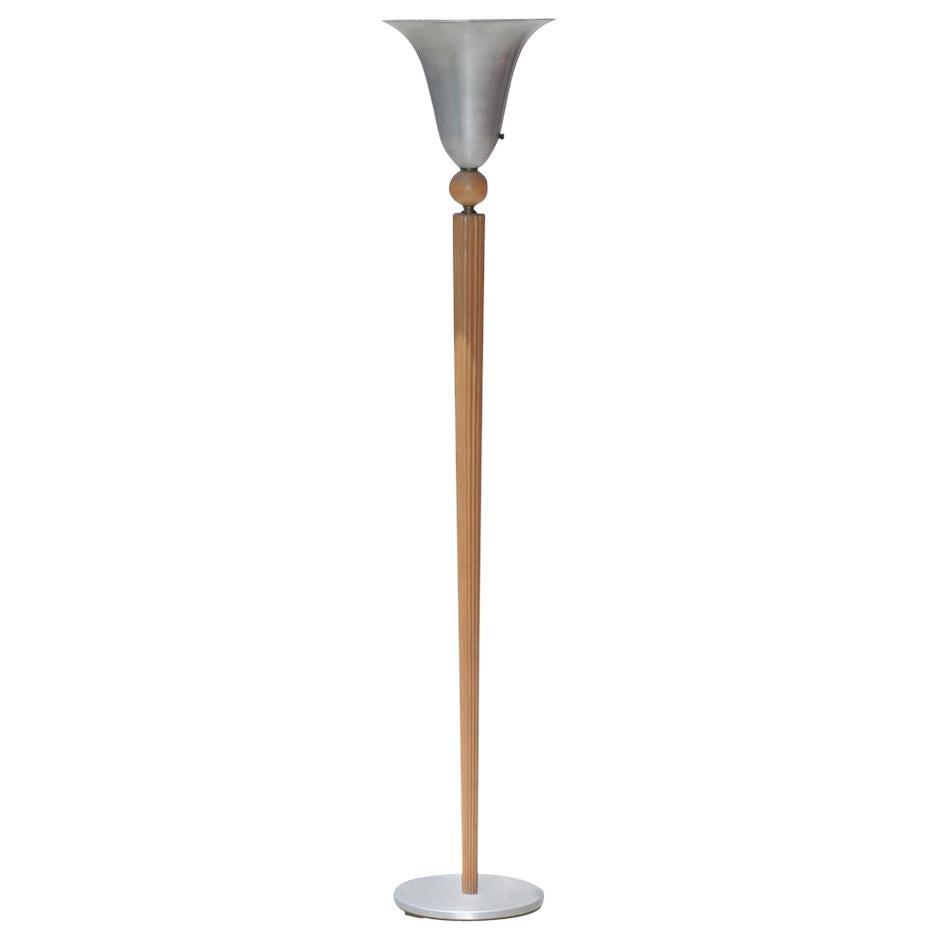 Art Deco Torchiere Floor Lamp by Russel Wright: Art Deco carved wood torchiere floor lamp with aluminum shade designed by Russel Wright. Details Creator Russel Wright (Designer) Dimensions Height: 64.5 in. (163.83 cm)Diameter: 12.5 in. (31.75 cm) S