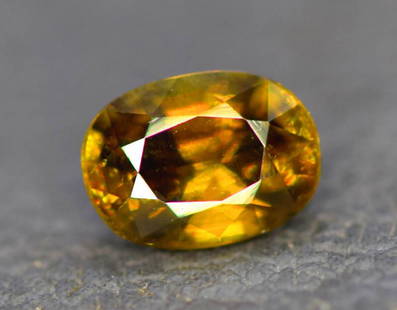 1.25 CT Natural Full Fire Sphene Titanite Gemstone: Dimensions (mm) 7 x 5 x 4mm Weight (carats) 1.25 carats Colors Type Faceted Treatment No Treatment 1.25 CT Natural Full Fire