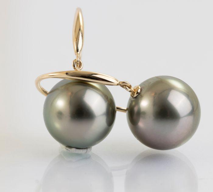 14 kt. Yellow Gold - 10x11mm Golden Green Tahitian Pearls - Earrings: Title: 14 kt. Yellow Gold - 10x11mm Golden Green Tahitian Pearls - Earrings Description: Emerging from the tropical lagoons of French Polynesia, these Tahitian pearls have been hand selected for their