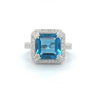 Jude Frances London Blue Topaz and Diamond 18k White Gold Halo Ring Size 6.5: Condition: Excellent Condition, Professionally Cleaned and Polished Metal: 18k Gold (Marked, and Professionally Tested) Gemstone: 5.51ct Square Cut London Blue Topaz Diamonds: Round Brilliant