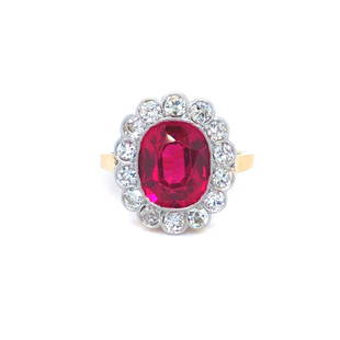 Antique Early 1900's 14k Gold and Platinumn Ruby and Diamond Halo Ring Size 5: Condition: Very Good Metal: 14k Gold and Platinum (Marked, and Professionally Tested) Gemstone: 3.8ct Synthetic Rectangular Cushion Shaped Ruby Diamonds: Round Old Cut Diamonds .70ctw Diamond