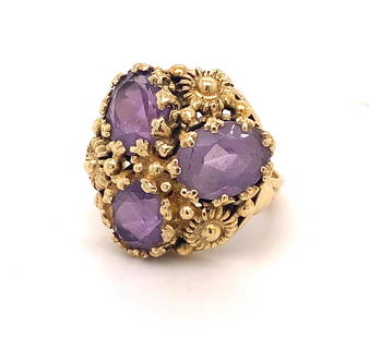 Vintage Designer Amethyst 14K Yellow Gold Ring: This is a beautiful vintage ring set with three amethyst and flowing art nouveau design. The ring is marked G 14k. The natural amethyst are oval shape with nice light color and good clarity estimated