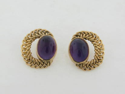 Beautiful Susan Berman Oval Cabochon Amethyst 18K Gold Ear Clips 21.5 Grams: Beautiful Signed With The Makers Mark For Susan Berman Oval Cabochon Cut and Polished Gem AAA Quality Amethyst 18K Gold Ear Clips 21.5 Grams. They measure 15.4 mm x 12 mm. These are an exquisite pair