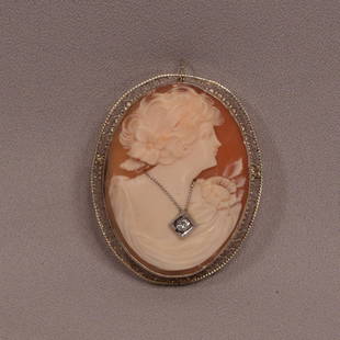 Antique Marked 14k White Gold & Diamonds Cameo Pendant Brooch: Antique Marked 14k White Gold & Diamonds Cameo Pendant Brooch. It has a folding ring at the top allowing the new owner to wear it as a pendant or fold the ring down and use it as a pin on the back as