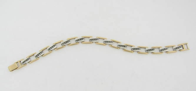 Vintage Unisex Bracelet 14K Gold 60 Silver Set Diamonds: Vintage Unisex Bracelet 14K Gold 60 Silver Set Diamonds. The design has 12 links with 5 silver set diamonds in each link. It has 13 links 14K gold that border the diamonds links. The bracelet