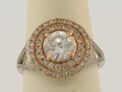 Vintage 102 Diamonds Ring 14k Bi Color Gold 1.89 Carats: Beautiful vintage diamonds ring set in a 14k white and yellow gold mounting. The mounting is marked 14k. The center diamond measures 1.15 carats, it grades H-I color and I clarity. The ring has 2
