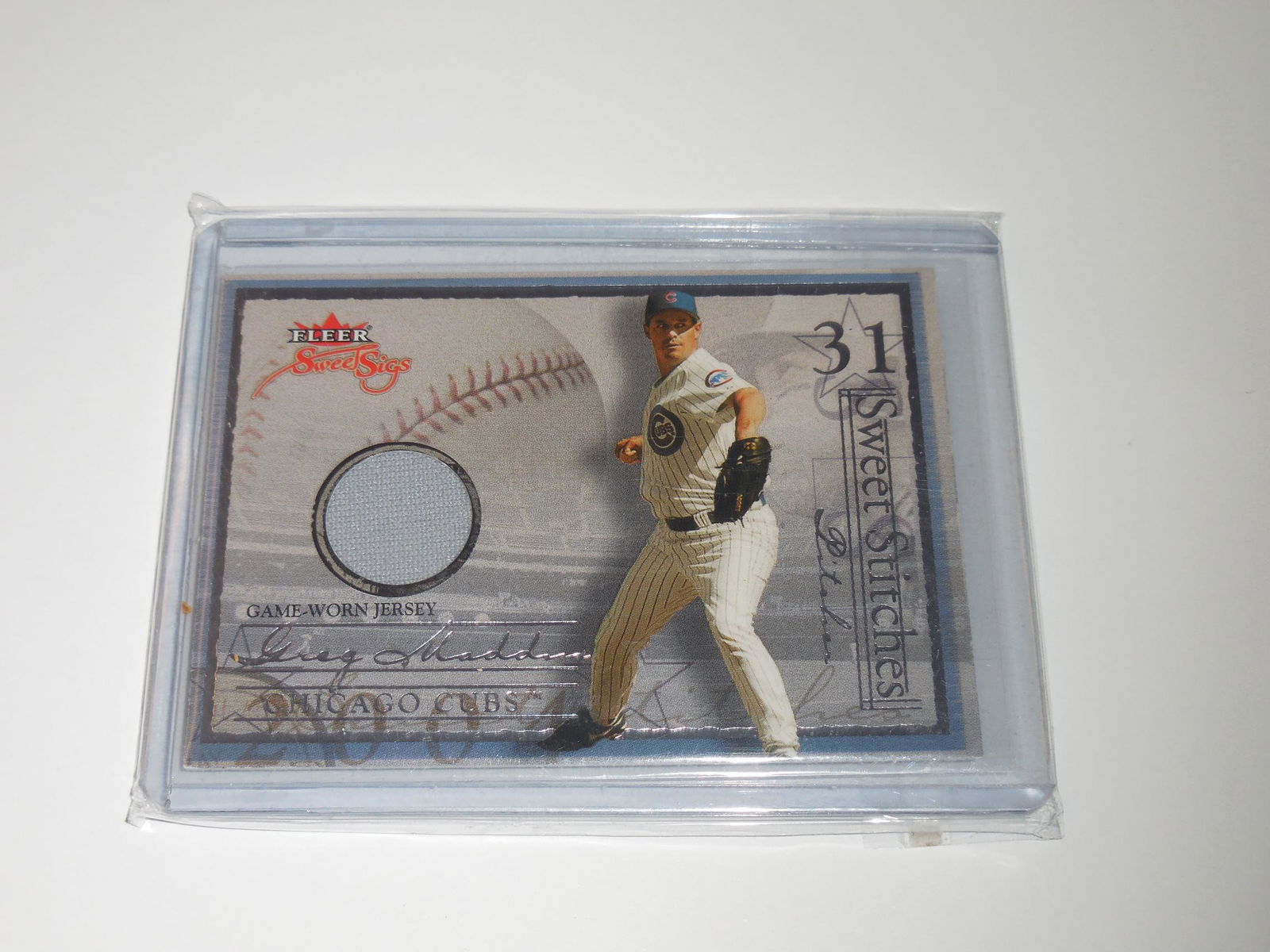 2004 FLEER GREG MADDUX GAME USED JERSEY (1 of 2)