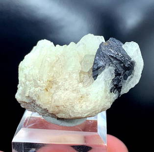 Cassiterite Specimen Natural Rare Cassiterite Crystal on: Cassiterite Specimen, Natural Rare Cassiterite Crystal on White Albite Mineral Specimen From Pakistan, Weight : 123.30 cts Dimensions: 36*30*21 mm Treatment : Natural Origin : Pakistan MPG1_15 