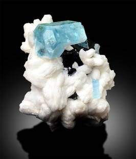 Aquamarine Crystals on Black Tourmaline Schorl and Albite from: Aquamarine Crystals on Black Tourmaline Schorl and Albite from Afghanistan. Its an incredible specimen for collection. Aquamarine Crystals are double terminated and damage free. Crystals have natural