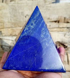 400 Grams Hand Crafted Lapis Lazuli Pyramid: Title: 400 Grams Hand Crafted Lapis Lazuli Pyramid Name: Lapis Lazuli Color: Blue Weight: 400 Grams Origin: Afghanistan Shape: Pyramid Reserve: $100.00 Shipping:Domestic: Flat-rate of $50.00 to