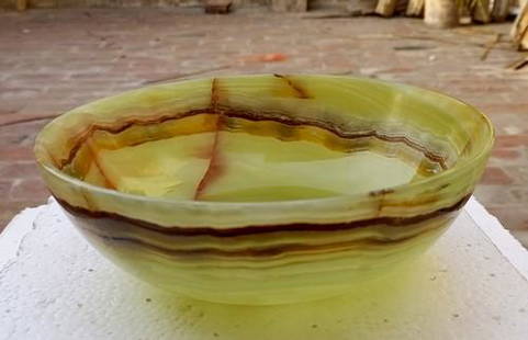 Hand Crafted Stunning 8 Inch Onyx Bowl: Title: Hand Crafted Stunning 8 Inch Onyx Bowl Name: Onyx Color: Yellow Shape: Bowl Reserve: $130.00 Shipping: Domestic: Flat-rate of $60.00 to anywhere within the contiguous U.S. International: Foreig