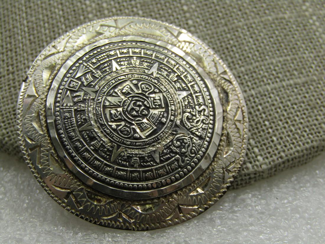 Vintage Stering Mayan Sun Brooch Pendant, Signed EME, Mexico 1980's: Vintage Stering Mayan Sun Brooch Pendant, Signed EME, Mexico 1980's, marked Mexico and sterling and tested. Appx. 13.92 gr. Tiered design with diamond cut etchings. It is appx. Can be worn as a brooch