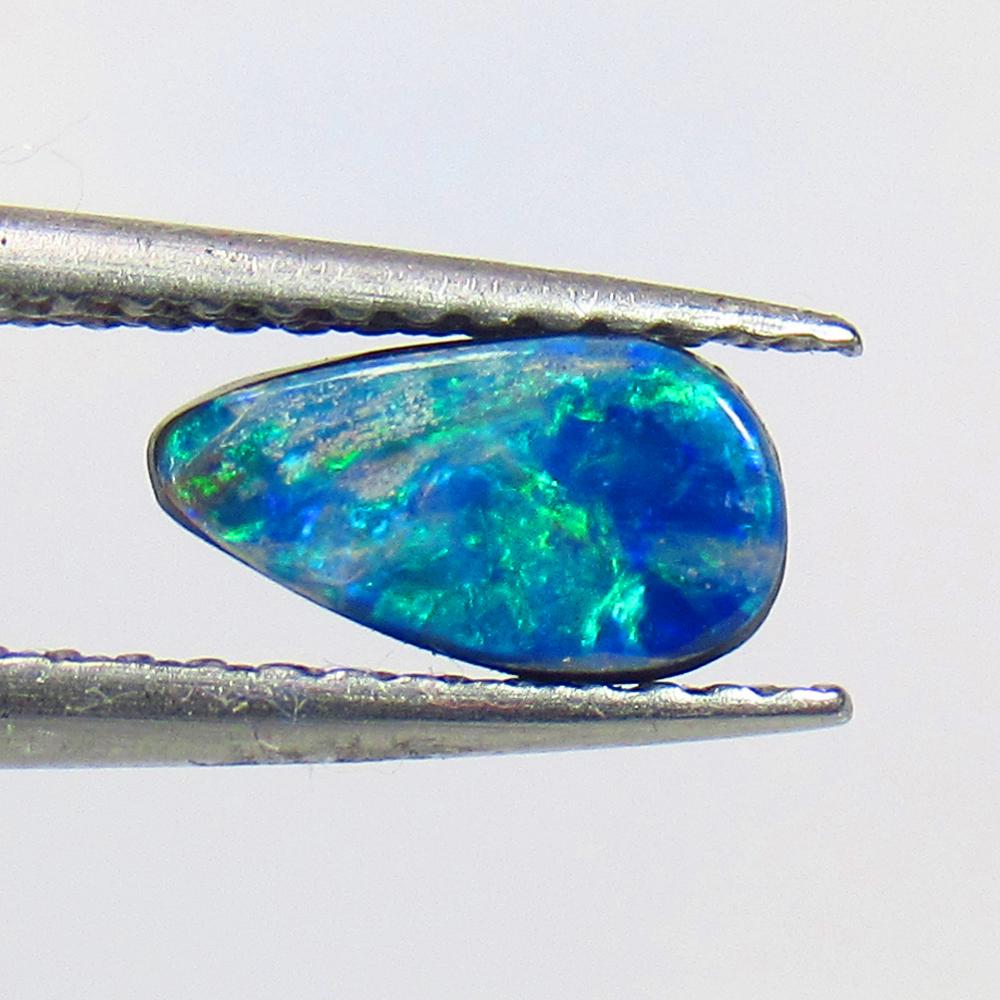 0.84 Ctw Natural Australian Doublet Opal Pear Cabochon: No Reserve! Title: 0.84 Ctw Natural Australian Doublet Opal Pear Cabochon Stone Clarity: Opaque Gemstones: Natural Australian Opal Carat Weights: 0.84 Size/Dimensions: 7.90 x 4.30 x 2.70 mm Additional