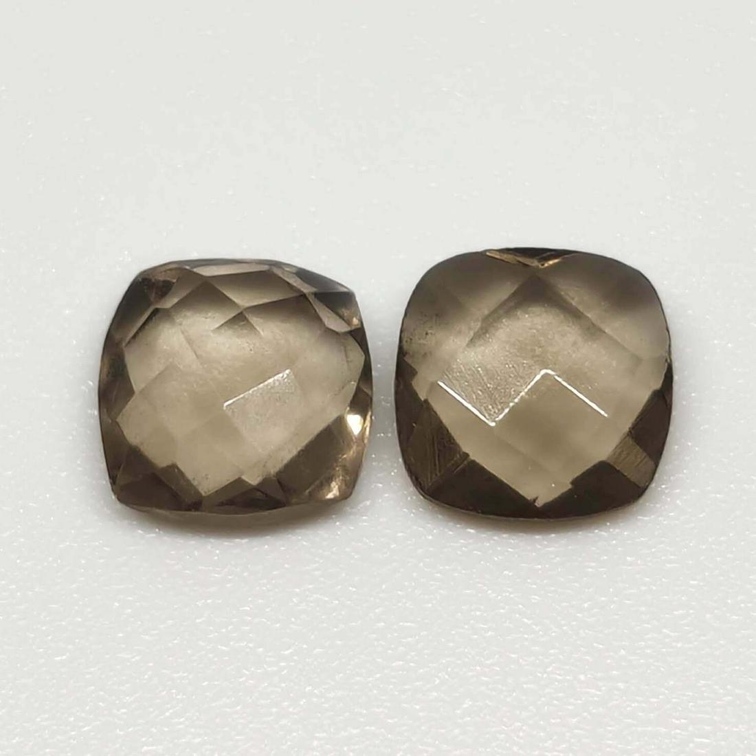 2.85 ct Natural Smoky Quartz Pair: No Reserve! Title: 2.85 ct Natural Smoky Quartz Pair Additional Information: Gemstones: Smoky Quartz Carat Weights: 2.85 ct Size/Dimensions: 7 X 7 mm Origin : Scotland Materials Techniques: Quartz Wei