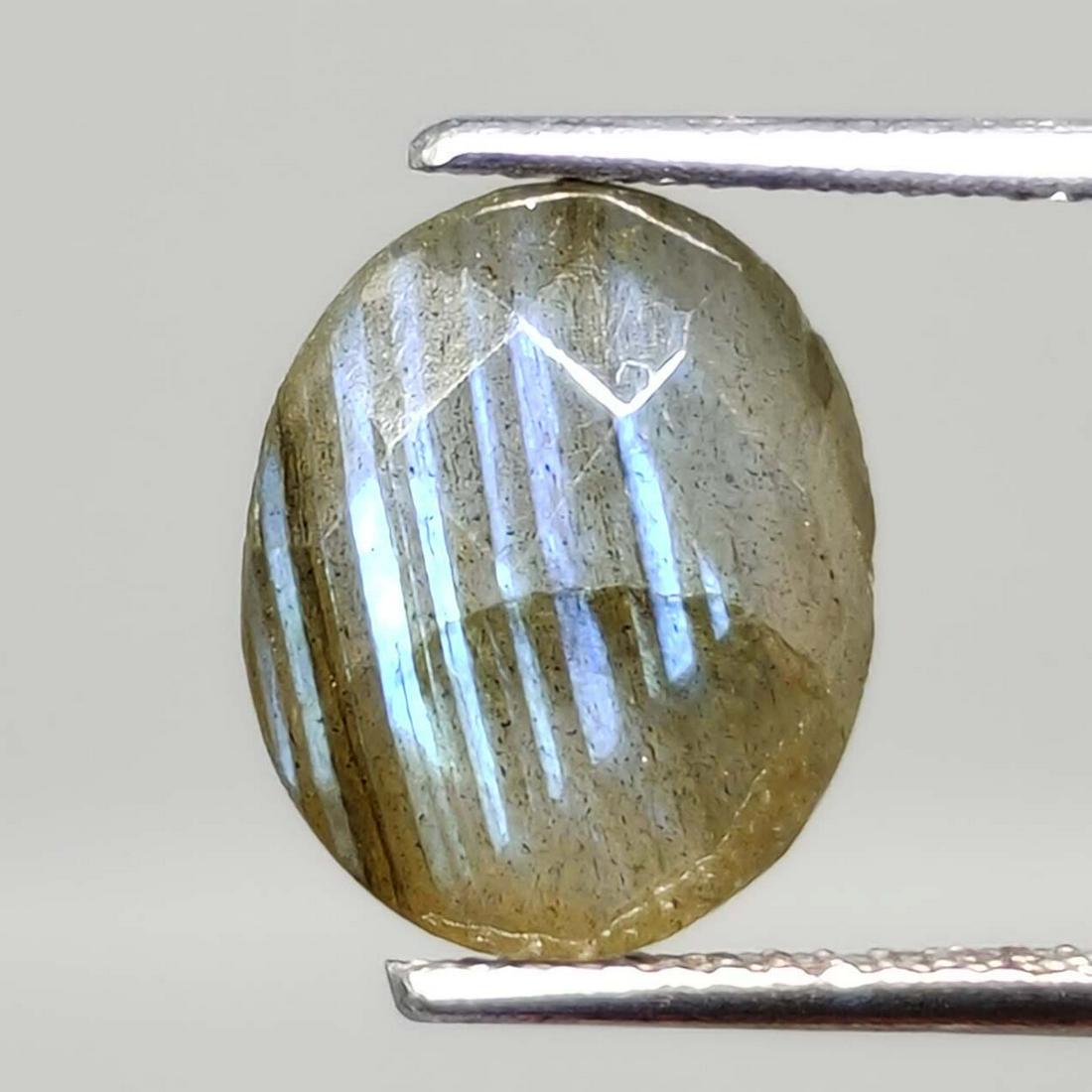 3.25 ct Natural Faceted Labradorite: No Reserve! Title: 3.25 ct Natural Faceted Labradorite Additional Information: Gemstones: Labradorite Carat Weights: 3.25 ct Size/Dimensions: 11 X 9 mm Origin : Labrador Materials Techniques: Labrador