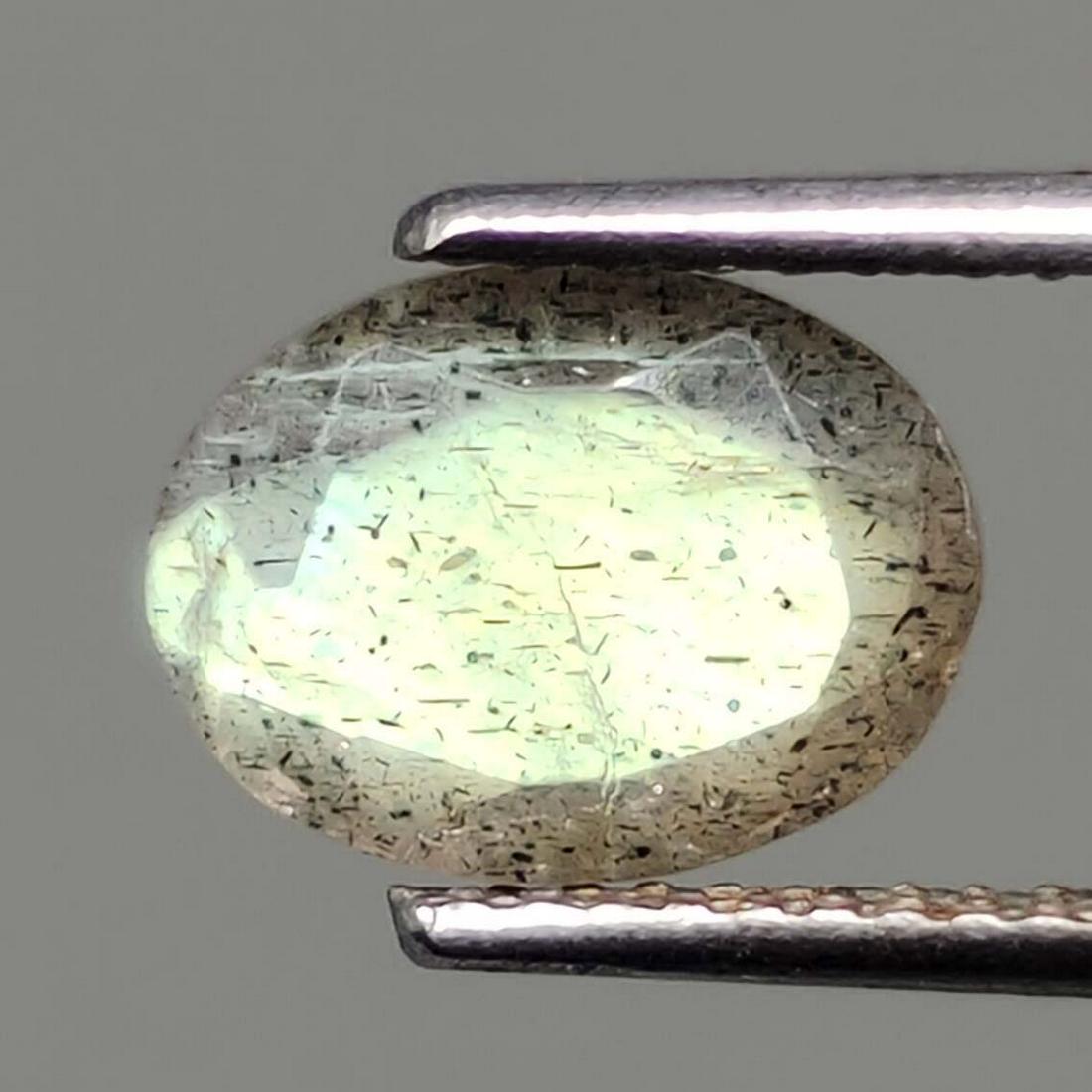 1.65 ct Natural Faceted Labradorite: No Reserve! Title: 1.65 ct Natural Faceted Labradorite Additional Information: Gemstones: Labradorite Carat Weights: 1.65 ct Size/Dimensions: 7 X 9 mm Origin : Labrador Materials Techniques: Labradori