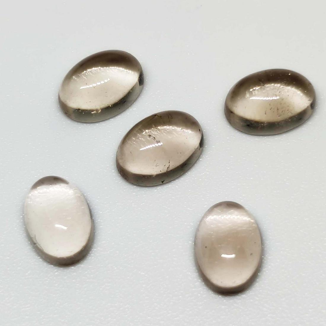 6 ct Natural Smoky Quartz Lot: No Reserve! Title: 6 ct Natural Smoky Quartz Lot Additional Information: Gemstones: Smoky Quartz Carat Weights: 6 ct Size/Dimensions: 7 X 5 mm Origin : Scotland Materials Techniques: Quartz Weight Uni