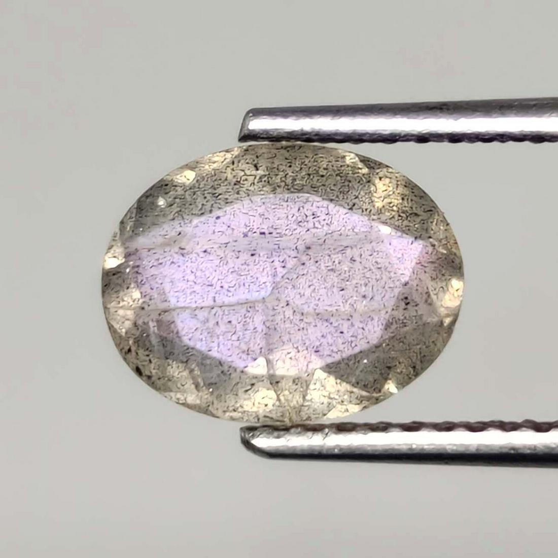 1.45 ct Natural Faceted Labradorite: No Reserve! Title: 1.45 ct Natural Faceted Labradorite Additional Information: Gemstones: Labradorite Carat Weights: 1.45 ct Size/Dimensions: 9 X 7 mm Origin : Labrador Materials Techniques: Labradori