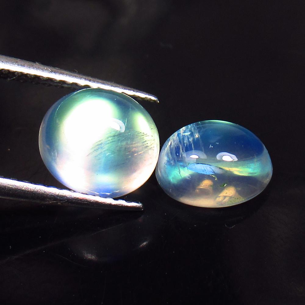 3.90 Ctw Natural Blue Moonstone Oval Pair: No Reserve! Title: 3.90 Ctw Natural Blue Moonstone Oval Pair Stone Clarity: Translucent Gemstones: Natural Moonstone Carat Weights: 3.9 Size/Dimensions: 8.20 x 7.30 x 5.30 mm / 2 Pc's Additional Infor