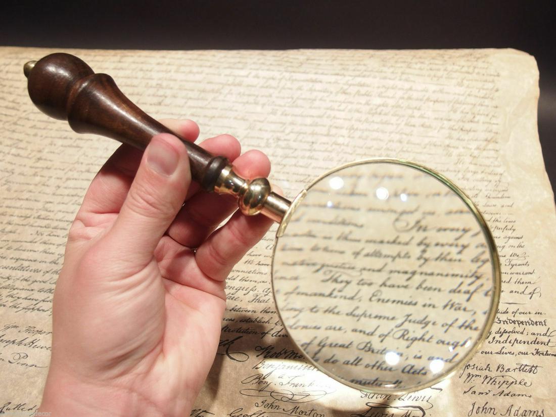 Magnifying Glass w Wood Turned Handle: 4" Wide lens x 9 1/2" Long. Nice reproduction of an antique Magnifying glass, with a turned wood handle. The magnification is not specified unfortunately. Magnifying glasses like this were used in the