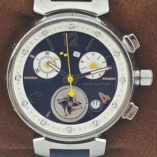 Louis Vuitton - Tambour Lady Chronograph - Ref. Q132D - Women - 2011-present: Brand: Louis Vuitton Model: Tambour Lady Chronograph 12 Brilliants on the dial Reference Number: Q132D Gender: Women Period: 2011-present Movement: Quartz Case material: Steel Extras: Box, Documents,