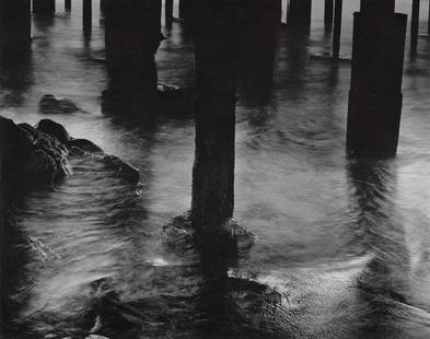 WYNN BULLOCK - Pilings Under Cannery Row, 1958: Artist: Wynn BullockTitle: Pilings Under Cannery Row, 1958Medium: Photo Litho, 1971, USADimensions: 9.95x7.85"Description: Heat Wax Mounted on 11x14" Conservation BoardArtist Bio: Wynn Bullock