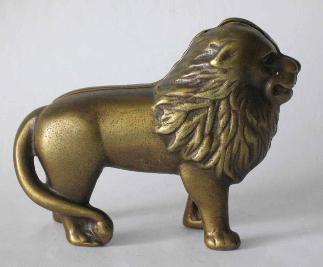 Unusual vintage cast brass lion penny bank. (1 of 3)