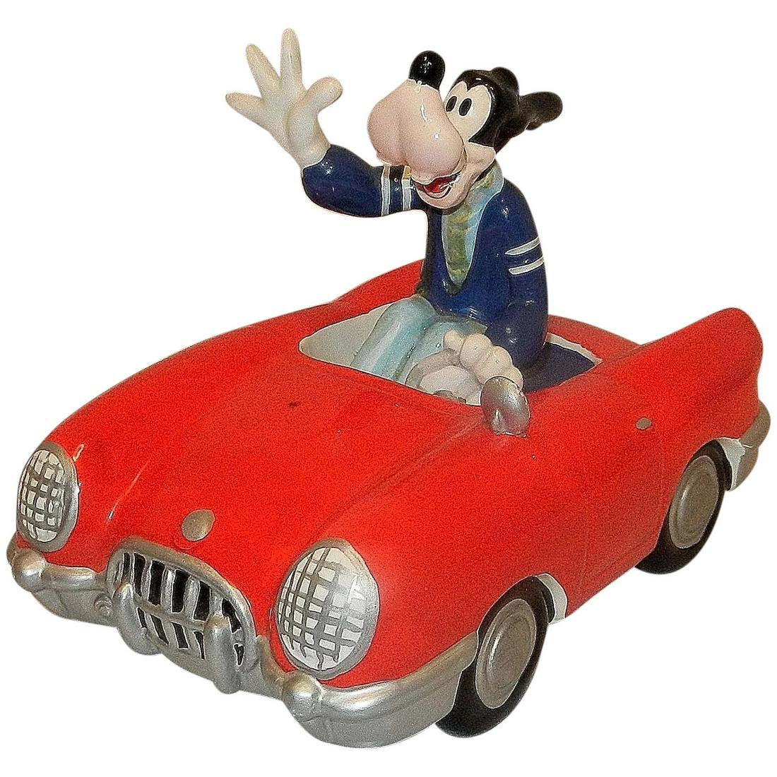Vintage Walt Disney Company Goofy in Red Convertible Music Box: This Vintage Walt Disney Company Schmid Music Box Goofy in Car is in excellent condition. Music Box plays like new and I see no chips, flea bites etc. Distributed by San Francisco Music Box Co. Plays: