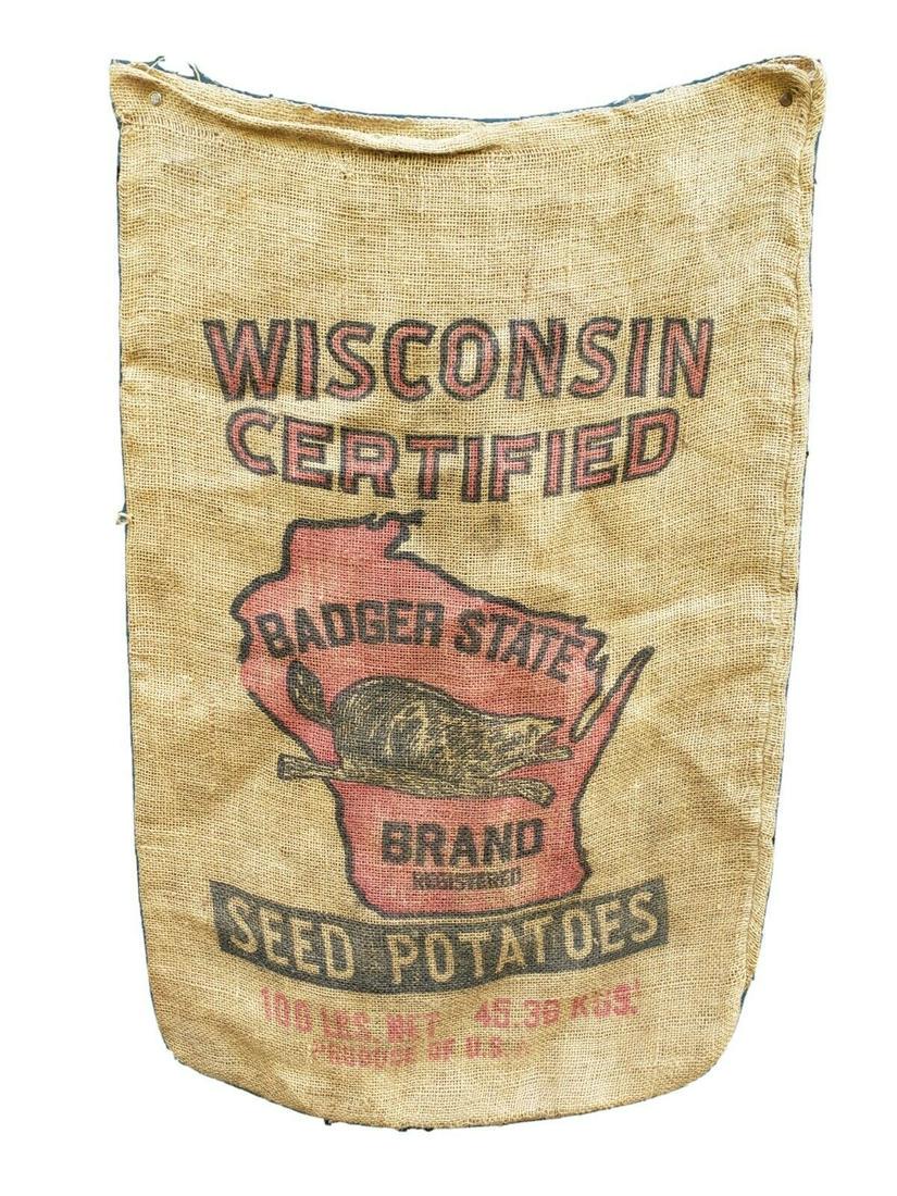 Wisconsin badger potato sack bag with graphics burlap: Great looking piece in excellent condition. Might have a side hole but non in graphics area Measures approximately 22 x 36 " . Shipping charges include insurance. Shipping: Domestic: Flat-rate of $9.0