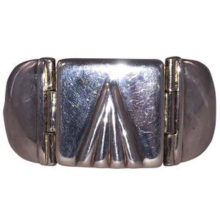 Italian Retro Inspired Sterling Silver Jingle Bracelet: Italian hollow jingle Retro inspired cuff bracelet. Circa 1980's. Center square measures 1 1/2" by 1 1/2", bracelet tapers from 1 1/2" to 3/4" wide. Marked, Italy, *333,AR, 925. Weighs, 77.7 grams. 