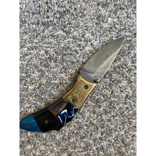 Folding everyday carry damascus steel knife handmade bone: Knife "Emmitsburg" made of damask steel. Handle – bone and scabbard - genuine leather. Damascus knives are very durable, look great and keep sharpness perfectly. Damascus steel has high