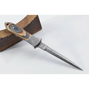 Handmade damascus steel knife combat dagger work wood: Blade - damask steel Handle – exotic wood, damascus steel bolsters Leather sheath – included Blade hardness – 55-58 HRC Total length – 8,5 (inch) Blade length - 4,4 (inch)