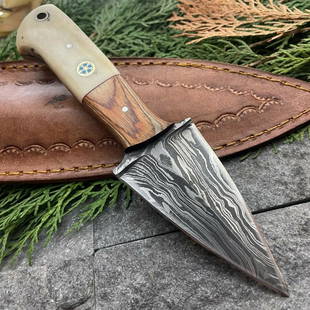 Everyday carry exclusive damascus steel knife wood work: Blade - damask steel Handle – wood, camel bone Leather sheath – included Blade hardness – 58-60 HRC Total length – 7 (inch) Blade length - 3 (inch) Blade Thickness – 3-4