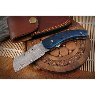 Everyday carry folding work pocket damascus steel knife: Blade - damask steel Handle – engraved steel Leather sheath – included Blade hardness – 56-58 HRC Total length – 6 (inch) Blade length - 3 (inch) Blade Thickness – 3-4