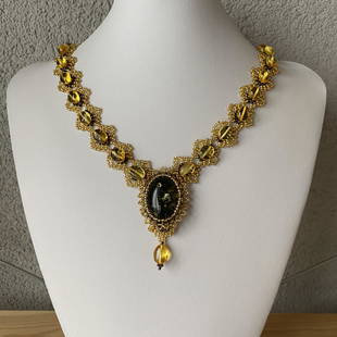 Staggering Unique Vintage Amber Floral Necklace made from leaf like bead ornaments: Title: Staggering Unique Vintage Amber Floral Necklace made from leaf like bead ornaments Metal Purity: NoneGemstone: AmberWeight: 37.3 gSize: Size: 480.0 x 60.0 x 10.0 mm Size: 18.898 x 2.362 x