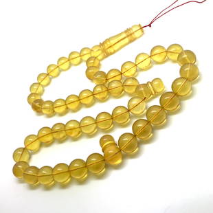 Beautiful Amber Tesbih made from Round Amber beads: Title: Beautiful Amber Tesbih made from Round Amber beadsMetal Purity: NoneGemstone: AmberWeight: 40.2 gSize: Bead size: 11.3 mm Bead size: 0.445 inches Made of: Reconstituted AmberAdditional