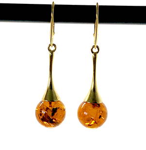 Exquisite Amber Earrings: Title: Exquisite Amber EarringsMetal Purity: Sterling SilverGemstone: AmberWeight: 5.68 gSize: Size: 48.5 x 12.1 x 12.1 mm Size: 1.909 x 0.476 x 0.476 inches Made of: Whole StoneAdditional