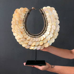 Decorative Papua necklace: Title: Decorative Papua necklace Maker: Iatmul TribeOrigin: Papua New GuineaDate/Period: 2021Materials: Shells, natural fibres, steelDimensions:H: 41 cm / 16.1 inches W: 37 cm / 14.5