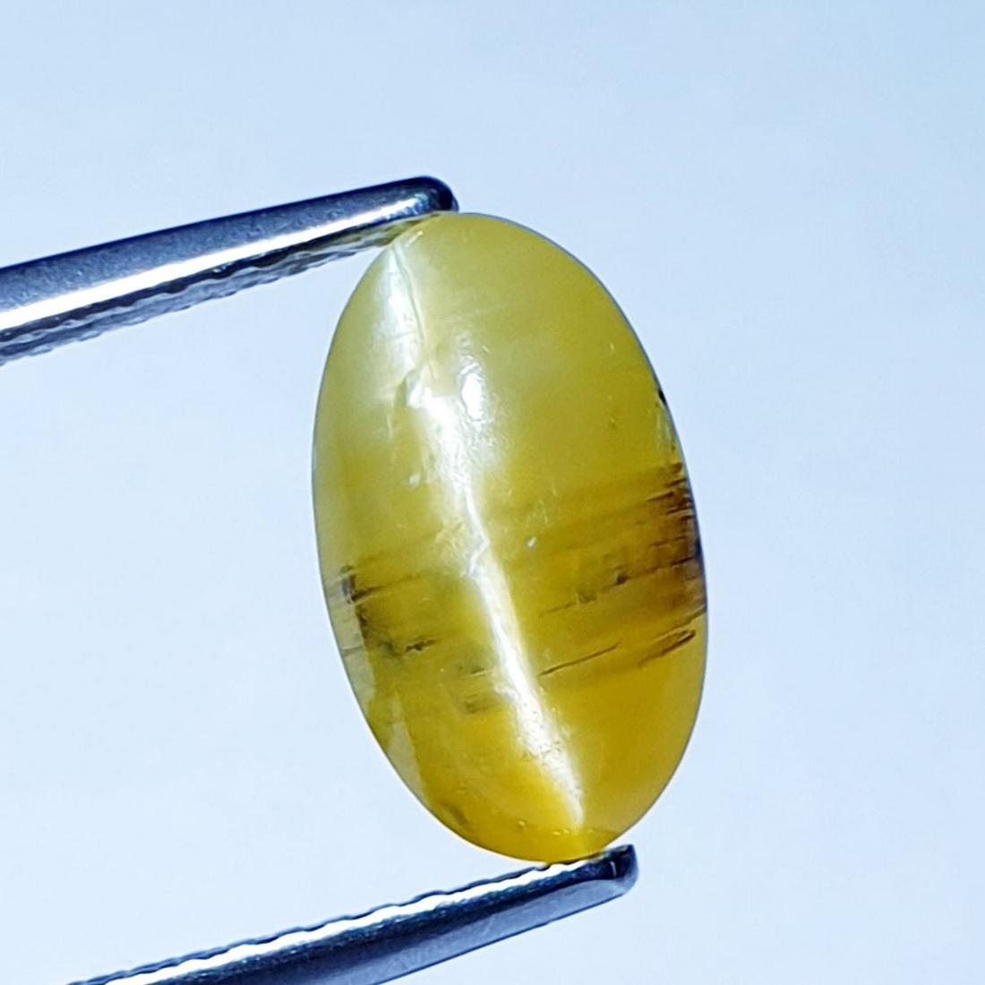 3.32 ct Natural Opal Cat's Eye: No Reserve! Title: 3.32 ct Natural Opal Cat's Eye Color/Clarity: Semi Transparent Gemstones: Loosegemstone Carat Weights: 3.2 Size/Dimensions: 10.10 x 7.20 x 7.20 Additional Information: Oval - Africa