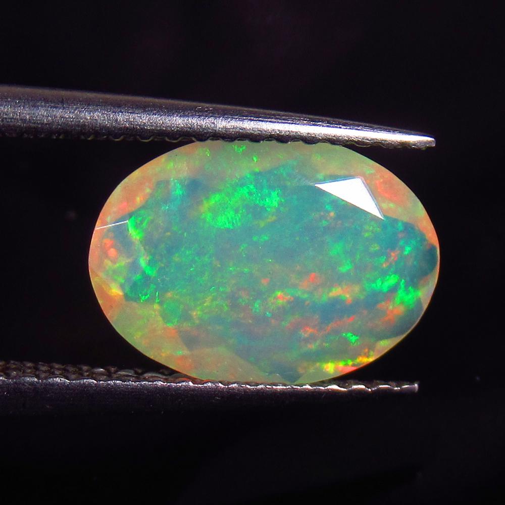 1.15 Ct Natural Ethiopian Multicolor Opal Oval Cut (1 of 2)